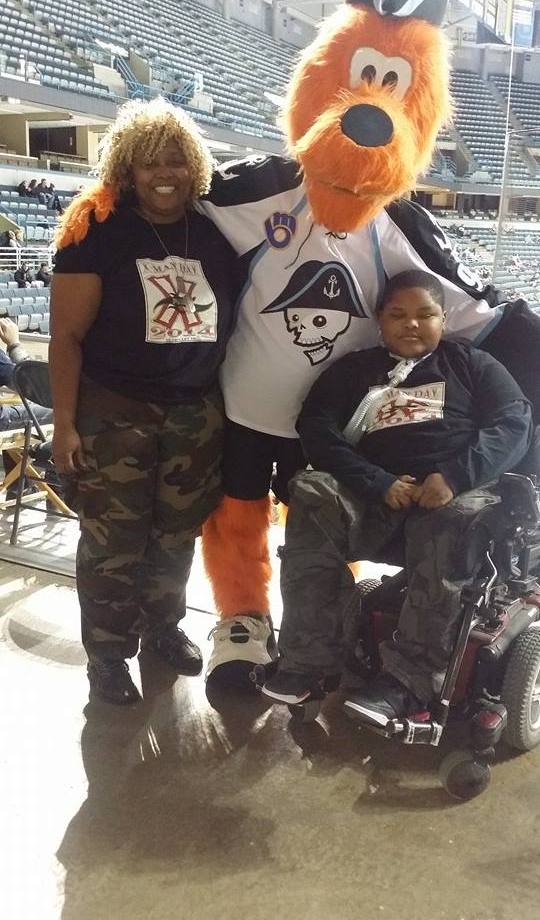Spokeswoman Valetta Bradford, the mascot for Milwaukee Admrial's and Xzavier campaign at the Admirals v. Wolves game